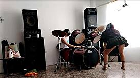 Neighbors Play Drums As She Strips And Shakes Her Huge Ass