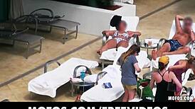 Does this sun bathing beauty really slide her bikini bottoms aside for a public pov fuck?