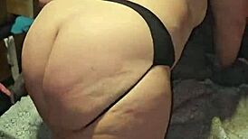 Hey, stepmother is stripping in her new thong, showing off those big tits