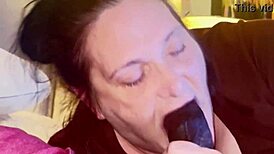 hot thick midget slurps and sucks on big black cock, choking and licking.