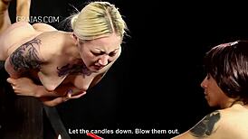 girls whipped and put above candles, oh man that's intense