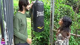 During boxing practice she hits neighbor and sucks his big cock