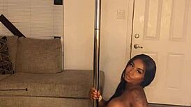 Ebony beauty shakes her fat ass on a huge pole