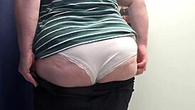 Big ass milf tries on tight leggings in the fitting room