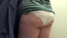 Big ass milf tries on tight leggings in the fitting room