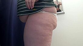 Big ass milf tries on tight leggings in the fitting room