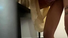 She takes dildo deep in ass, hiding from husband!