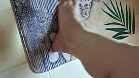 washing dirty feet in the bathtub