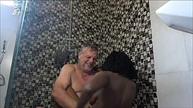 Ebony milf enjoys pussy licking in shower by sugardaddy.
