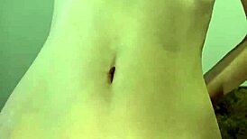 Is this petite teen masturbating with a dildo, so wet and tight