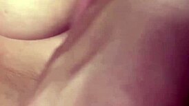 hot blonde boldly shows off huge tits in softcore scene