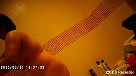 spy camera catches nude tits in the shower
