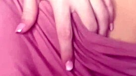 hot blonde boldly shows off huge tits in softcore scene