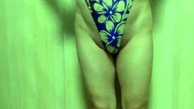 Gorgeous Gold Leotard Babe Endures Long Anal Plug Training