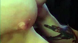 Teasing big perfect natural tits with cum on them