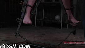 is she engulfing that hard toy penis like a slave?