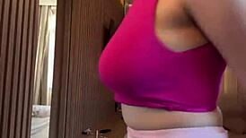 Feeling the intense pleasure as stepmother indulges in her big milky tits on webcam.