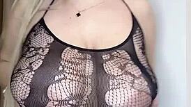 milf in see-through clothes caresses her big natural tits