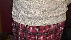 That big redhead milf with massive boobs gives an intense blowjob in this casual scene.