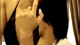 Aum Lights Up While Performing Handjob in Crossdressing Scene