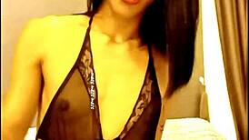 Aum Lights Up While Performing Handjob in Crossdressing Scene