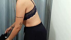 She casually invites a stranger into the store's fitting room for a quick chat