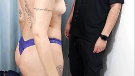 She casually invites a stranger into the store's fitting room for a quick chat