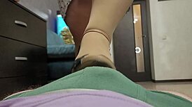 beautiful bbw goddess in flesh colored pantyhose plays with slaves cock with heels and feet