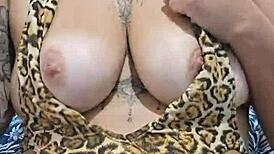 She's flashing with wild horniness, inviting cum on her tits and armpits in this fetish display