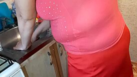 I Jerk Off To My Neighbor In The Kitchen While She Is Preparing Dinner