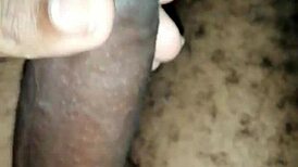 Masturbating with my big black cock balls!