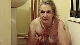 Slave Eats from Bowl in Humiliation BDSM Scene