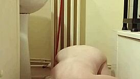 Slave Eats from Bowl in Humiliation BDSM Scene