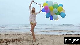 I'm Blondie Farncy Torino, a skinny Italian MILF, playing with balloons naked on the beach