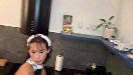 Maid in uniform licks tongue close-up during forbidden stay