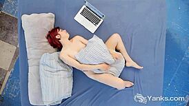 Yanks Minx Hedera Helix masturbates to orgasm with her hairy pussy, natural tits, and curly red hair.