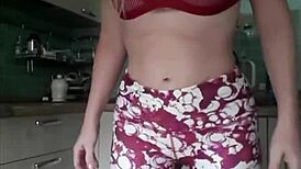 Horny amateur pees in sexy gym pants at the gym.