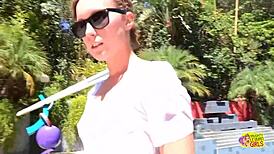 These two lesbians are having fun outdoors by the pool, so they start kissing passionately!