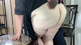 horny milf secretary blows black cock in office