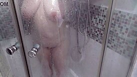 this hot stepmom in the shower got me jerking off watching her big tits