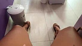 Latina student fingers huge wet pussy in public toilet flashing swollen lips to clients!
