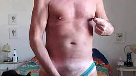 Pervy papifachero is playing with his big daddy boner bulge in turquoise thong!