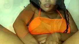 Young Latina with natural big tits masturbating with a dildo?