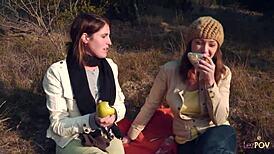Lesbian couple heats up with strapon outdoors