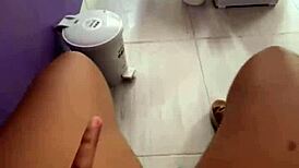 Latina student fingers huge wet pussy in public toilet flashing swollen lips to clients!