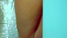 College desi girl intensely masturbates with a glass dildo, wearing a sexy dress and sneakers, reaching a powerful orgasm.