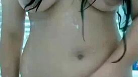 Pakistani stepmom slips dildo into her ass in the bathroom, moaning with error-filled pleasure