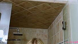 elegant blonde model enjoys a sensual bath