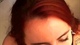 Redhead Gives Oral In Private Club.