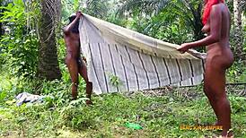 is this mature african slut with big tits getting passionately stroked? watch her in hardcore group action